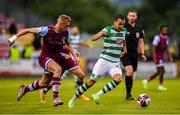 25 June 2021; Graham Burke of Shamrock Rovers in action against Killian Phillips of Drogheda United during the SSE Airtricity League Premier Division match between Shamrock Rovers and Drogheda United at Tallaght Stadium in Dublin. Photo by Seb Daly/Sportsfile