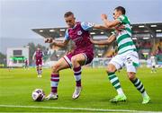 25 June 2021; Killian Phillips of Drogheda United in action against Graham Burke of Shamrock Rovers during the SSE Airtricity League Premier Division match between Shamrock Rovers and Drogheda United at Tallaght Stadium in Dublin. Photo by Seb Daly/Sportsfile
