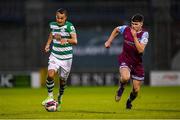 25 June 2021; Graham Burke of Shamrock Rovers in action against James Clarke of Drogheda United during the SSE Airtricity League Premier Division match between Shamrock Rovers and Drogheda United at Tallaght Stadium in Dublin. Photo by Seb Daly/Sportsfile