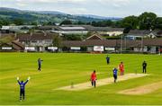 26 June 2021; North West Warriors claim a wicket during the Cricket Ireland InterProvincial Trophy 2021 match between North West Warriors and Munster Reds at Bready Cricket Club in Magheramason, Tyrone. Photo by Harry Murphy/Sportsfile