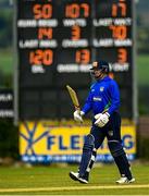 26 June 2021; William Porterfield of North West Warriors raises his bat as he reaches 50 runs during the Cricket Ireland InterProvincial Trophy 2021 match between North West Warriors and Munster Reds at Bready Cricket Club in Magheramason, Tyrone. Photo by Harry Murphy/Sportsfile