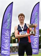 26 June 2021; Ciaran Connolly of Le Chéile AC, Kildare, pictureed with the trophy after winning the Men's High Jump during day two of the Irish Life Health National Senior Championships at Morton Stadium in Santry, Dublin. Photo by Sam Barnes/Sportsfile