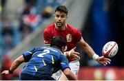 26 June 2021; Conor Murray of British and Irish Lions in action against Atsushi Sakate of Japan during the 2021 British and Irish Lions tour match between the British and Irish Lions and Japan at BT Murrayfield Stadium in Edinburgh, Scotland. Photo by Ian Rutherford/Sportsfile