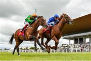 26 June 2021; Hurricane Lane, right, with William Buick up, on their way to winning the Dubai Duty Free Irish Derby, from second place Lone Eagle, with Frankie Dettori up, during day two of the Dubai Duty Free Irish Derby Festival at The Curragh Racecourse in Kildare. Photo by Seb Daly/Sportsfile