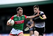 26 June 2021; Darren McHale of Mayo in action against Karl McKenna of Sligo during the Connacht GAA Football Senior Championship Quarter-Final match between Sligo and Mayo at Markievicz Park in Sligo. Photo by David Fitzgerald/Sportsfile