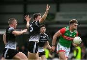 26 June 2021; Aidan O'Shea of Mayo in action against Eddie McGuinness, centre, and Paul McNamara of Sligo during the Connacht GAA Football Senior Championship Quarter-Final match between Sligo and Mayo at Markievicz Park in Sligo. Photo by David Fitzgerald/Sportsfile