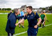26 June 2021; Antrim manager Darren Gleeson, right, and Dublin manager Mattie Kenny following the Leinster GAA Hurling Senior Championship Quarter-Final match between Dublin and Antrim at Páirc Tailteann in Navan, Meath. Photo by Stephen McCarthy/Sportsfile