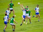 26 June 2021; Iain Corbett of Limerick in action against Michael Kiely of Waterford during the Munster GAA Football Senior Championship Quarter-Final match between Limerick and Waterford at LIT Gaelic Grounds in Limerick. Photo by Piaras Ó Mídheach/Sportsfile