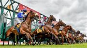 26 June 2021; Bucky Larson, left, with Sam Ewing up, leaves the stalls alongside fellow runners and riders at the start of the Dubai Duty Free Handicap during day two of the Dubai Duty Free Irish Derby Festival at The Curragh Racecourse in Kildare. Photo by Seb Daly/Sportsfile