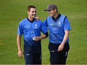 26 June 2021; Josh Little, left, and Kevin O'Brien of Leinster Lightning share a joke during the Cricket Ireland InterProvincial Trophy 2021 match between Northern Knights and Leinster Lightning at Bready Cricket Club in Magheramason, Tyrone. Photo by Harry Murphy/Sportsfile