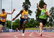 26 June 2021; Israel Olatunde of UCD AC, Dublin, centre, celebrates winning the Men's 100m during day two of the Irish Life Health National Senior Championships at Morton Stadium in Santry, Dublin. Photo by Sam Barnes/Sportsfile