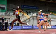 26 June 2021; Rhasidat Adeleke of Tallaght AC, Dublin, left, crosses the line to win the Women's 100m ahead of Molly Scott of St Laurence O'Toole AC, Carlow, during day two of the Irish Life Health National Senior Championships at Morton Stadium in Santry, Dublin. Photo by Sam Barnes/Sportsfile