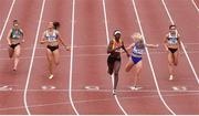26 June 2021; Rhasidat Adeleke of Tallaght AC, Dublin, centre, crosses the line to win the Women's 100m ahead of Molly Scott of St Laurence O'Toole AC, Carlow, second from right, during day two of the Irish Life Health National Senior Championships at Morton Stadium in Santry, Dublin. Photo by Sam Barnes/Sportsfile
