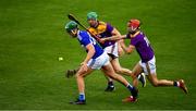 26 June 2021; James Ryan of Laois in action against Matthew O'Hanlon, centre, and Paul Morris of Wexford during the Leinster GAA Hurling Senior Championship Quarter-Final match between Wexford and Laois at UPMC Nowlan Park in Kilkenny. Photo by Ray McManus/Sportsfile