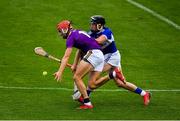 26 June 2021; Paul Morris of Wexford in action against Donnchadh Hartnett of Laois during the Leinster GAA Hurling Senior Championship Quarter-Final match between Wexford and Laois at UPMC Nowlan Park in Kilkenny. Photo by Ray McManus/Sportsfile