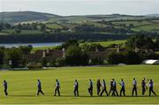 26 June 2021; Leinster Lightning and Northern Knights players shake hands after the Cricket Ireland InterProvincial Trophy 2021 match between Northern Knights and Leinster Lightning at Bready Cricket Club in Magheramason, Tyrone. Photo by Harry Murphy/Sportsfile
