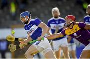 26 June 2021; Stephen Maher of Laois in action against Lee Chin of Wexford during the Leinster GAA Hurling Senior Championship Quarter-Final match between Wexford and Laois at UPMC Nowlan Park in Kilkenny. Photo by Ray McManus/Sportsfile