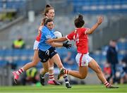 26 June 2021; Lyndsey Davey of Dublin in action against Méabh Cahalane, left, and Ciara O'Sullivan of Cork during the Lidl Ladies Football National League Division 1 Final match between Cork and Dublin at Croke Park in Dublin. Photo by Ramsey Cardy/Sportsfile