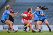 26 June 2021; Erika O'Shea of Cork in action against Carla Rowe, left, and Olwen Carey of Dublin during the Lidl Ladies Football National League Division 1 Final match between Cork and Dublin at Croke Park in Dublin. Photo by Ramsey Cardy/Sportsfile