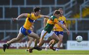 26 June 2021; Gavin White of Kerry in action against Cillian Brennan of Clare during the Munster GAA Football Senior Championship Quarter-Final match between Kerry and Clare at Fitzgerald Stadium in Killarney, Kerry. Photo by Dáire Brennan/Sportsfile