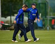 27 June 2021; Andy McBrine, left, and William Porterfield of North West Warriors celebrate the wicket of Simi Singh of Leinster Lightning during the Cricket Ireland InterProvincial Trophy 2021 match between North West Warriors and Leinster Lightning at Bready Cricket Club in Magheramason, Tyrone. Photo by Harry Murphy/Sportsfile