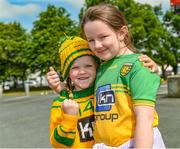 27 June 2021; Cassie Rose Melly, aged 7, from Lettermacaward, Donegal and Sam Bonner, aged 8, prior to the Ulster GAA Football Senior Championship Preliminary Round match between Down and Donegal at Páirc Esler in Newry, Down. Photo by Philip Fitzpatrick/Sportsfile
