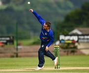27 June 2021; Andy McBrine of North West Warriors bowls during the Cricket Ireland InterProvincial Trophy 2021 match between North West Warriors and Leinster Lightning at Bready Cricket Club in Magheramason, Tyrone. Photo by Harry Murphy/Sportsfile