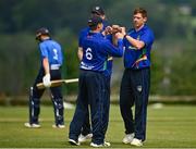 27 June 2021; Craig Young of North West Warriors, right, celebrates with team-mate William Porterfield after catching out Lorcan Tucker of Leinster Lightning during the Cricket Ireland InterProvincial Trophy 2021 match between North West Warriors and Leinster Lightning at Bready Cricket Club in Magheramason, Tyrone. Photo by Harry Murphy/Sportsfile