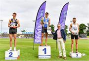 26 June 2021; Men's 1500m medallists, from left, Cathal Doyle of Clonliffe Harriers AC, Dublin, silver, Andrew Coscoran of Star of the Sea AC, Meath, gold, Kevin Kelly of St. Coca's AC, Kildare, bronze, as Willie Smith presents the cup during day two of the Irish Life Health National Senior Championships at Morton Stadium in Santry, Dublin. Photo by Sam Barnes/Sportsfile