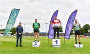 26 June 2021; Minister of State for Sport and the Gaeltacht Jack Chambers, left, with Men's Weight for Distance medallists, from left, John Dwyer of Templemore AC, Tipperary, silver, Sean Breathnach of Galway City Harriers AC, Gold, and Michael Healy of Youghal AC, Cork, bronze, during day two of the Irish Life Health National Senior Championships at Morton Stadium in Santry, Dublin. Photo by Sam Barnes/Sportsfile