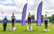 27 June 2021; Athletics Ireland Official Brian Dowling with Women's Triple Jump Medallists, from left, Grace Furlong of Waterford AC, silver, Saragh Buggy of St Abbans AC, Laois, gold, and  Aisling MacHugh of Naas AC, Kildare, bronze, during day three of the Irish Life Health National Senior Championships at Morton Stadium in Santry, Dublin. Photo by Sam Barnes/Sportsfile