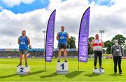 27 June 2021; Athletics Ireland Official John Meagher, right, with Men's Shot Put Medallists, from left, James Kelly of Finn Valley AC, Donegal, silver, Gavin McLaughlin of Finn Valley AC, Donegal, gold, and Sean Breathnach of Galway City Harriers, bronze, during day three of the Irish Life Health National Senior Championships at Morton Stadium in Santry, Dublin. Photo by Sam Barnes/Sportsfile