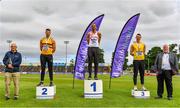 26 June 2021; Sport Ireland chief executive John Treacy, left, and Athletics Ireland President John Cronin, right, with Men's Long Jump medallists, from left, Sam Healy of Leevale AC, Cork, silver, Adam McMullen of Crusaders AC, Dublin, gold, and Shane Howard of Bandon AC, Cork, bronze, during day two of the Irish Life Health National Senior Championships at Morton Stadium in Santry, Dublin. Photo by Sam Barnes/Sportsfile