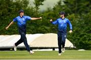 27 June 2021; George Dockrell of Leinster Lightning celebrates catching out Nathan McGuire of North West Warriors with team-mate David O'Halloran during the Cricket Ireland InterProvincial Trophy 2021 match between North West Warriors and Leinster Lightning at Bready Cricket Club in Magheramason, Tyrone. Photo by Harry Murphy/Sportsfile