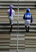 27 June 2021; Jockeys Kevin Manning, left, and Rory Cleary make their way to the parade ring ahead of the Barronstown Stud Irish EBF Maiden during day three of the Dubai Duty Free Irish Derby Festival at The Curragh Racecourse in Kildare. Photo by Seb Daly/Sportsfile