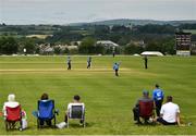 27 June 2021; Leinster Lightning players claim a wicket as spectators look on during the Cricket Ireland InterProvincial Trophy 2021 match between North West Warriors and Leinster Lightning at Bready Cricket Club in Magheramason, Tyrone. Photo by Harry Murphy/Sportsfile