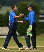 27 June 2021; Josh Little, left, and Lorcan Tucker of Leinster Lightning embrace after the Cricket Ireland InterProvincial Trophy 2021 match between North West Warriors and Leinster Lightning at Bready Cricket Club in Magheramason, Tyrone. Photo by Harry Murphy/Sportsfile