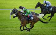 27 June 2021; Fastnet Crown, nearside, with Leigh Roche up, on their way to winning the Sherry FitzGerald Country Homes Handicap, from second place Goodnight Girl, with Chris Hayes up, during day three of the Dubai Duty Free Irish Derby Festival at The Curragh Racecourse in Kildare. Photo by Seb Daly/Sportsfile