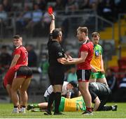 27 June 2021; Gerard McGovern of Down is shown a red card by referee Maurice Deegan during the Ulster GAA Football Senior Championship Preliminary Round match between Down and Donegal at Páirc Esler in Newry, Down. Photo by Ramsey Cardy/Sportsfile