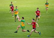 27 June 2021; Conor O'Donnell of Donegal in action against James Guinness of Down during the Ulster GAA Football Senior Championship Preliminary Round match between Down and Donegal at Páirc Esler in Newry, Down. Photo by Ramsey Cardy/Sportsfile