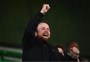 27 June 2021; Golfer Shane Lowry celebrates a score for Offaly during the Leinster GAA Football Senior Championship Round 1 match between Louth and Offaly at Páirc Tailteann in Navan, Meath. Photo by David Fitzgerald/Sportsfile