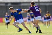 27 June 2021; Andy Maher of Wicklow has his jersey pulled by Kevin O'Grady of Wexford during the Leinster GAA Football Senior Championship Round 1 match between Wicklow and Wexford at County Grounds in Aughrim, Wicklow. Photo by Piaras Ó Mídheach/Sportsfile