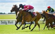 27 June 2021; Thundering Nights, right, with Shane Crosse up, on their way to winning the Alwasmiyah Pretty Polly Stakes, from second place Santa Barbara, left, with Ryan Moore up, during day three of the Dubai Duty Free Irish Derby Festival at The Curragh Racecourse in Kildare. Photo by Seb Daly/Sportsfile