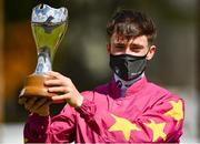 27 June 2021; Jockey Shane Crosse with the trophy after riding Thundering Nights to victory in the Alwasmiyah Pretty Polly Stakes during day three of the Dubai Duty Free Irish Derby Festival at The Curragh Racecourse in Kildare. Photo by Seb Daly/Sportsfile