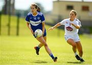 27 June 2021; Mo Nerney of Laois in action against Lauren Murtagh of Kildare during the Lidl Ladies Football National League Division 3 Final match between Kildare and Laois at Baltinglass GAA Club in Baltinglass, Wicklow. Photo by Matt Browne/Sportsfile