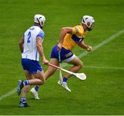 27 June 2021; Aron Shanagher of Clare heads goalwards before winning a penalty after being fouled by Shane Fives of Waterford, left, during the Munster GAA Hurling Senior Championship Quarter-Final match between Waterford and Clare at Semple Stadium in Thurles, Tipperary. Photo by Ray McManus/Sportsfile