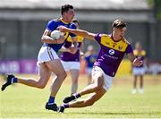 27 June 2021; Pádraig O'Toole of Wicklow gets away from Liam Coleman of Wexford during the Leinster GAA Football Senior Championship Round 1 match between Wicklow and Wexford at County Grounds in Aughrim, Wicklow. Photo by Piaras Ó Mídheach/Sportsfile