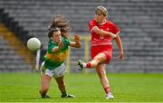 27 June 2021; Lauren Boyle of Louth in action against Carla Le Guen of Leitrim during the Lidl Ladies Football National League Division 4 Final match between Leitrim and Louth at St Tiernach's Park in Clones, Monaghan. Photo by Brendan Moran/Sportsfile
