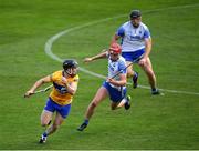 27 June 2021; Tony Kelly of Clare in action against Calum Lyons of Waterford during the Munster GAA Hurling Senior Championship Quarter-Final match between Waterford and Clare at Semple Stadium in Thurles, Tipperary. Photo by Ray McManus/Sportsfile