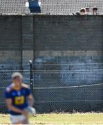 27 June 2021; Spectators look over a wall, from outside the ground, during the Leinster GAA Football Senior Championship Round 1 match between Wicklow and Wexford at County Grounds in Aughrim, Wicklow. Photo by Piaras Ó Mídheach/Sportsfile